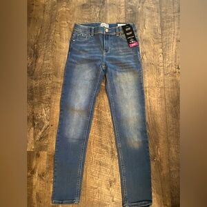 selling these jeans I got them they were to little still new has tag. Girls 16